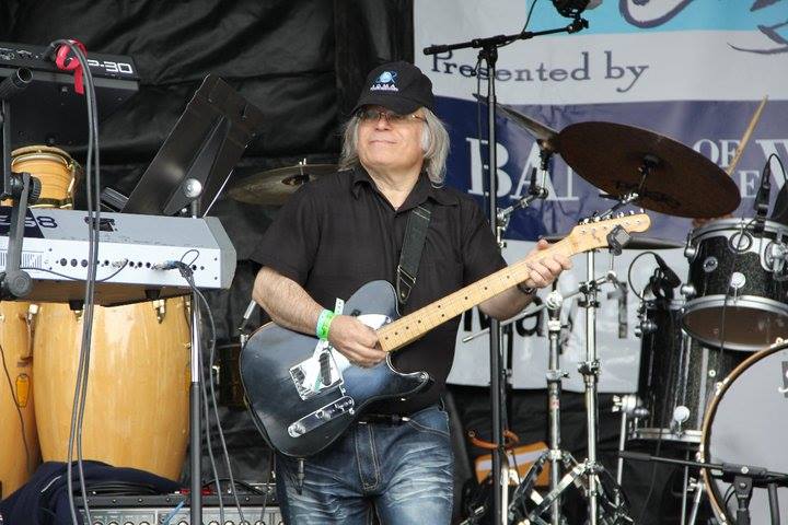 Bruce Nazarian playing guitar